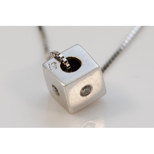 96 - A 9ct white gold contemporary diamond set cube pendant with necklace, 5mm cube, 1.5g