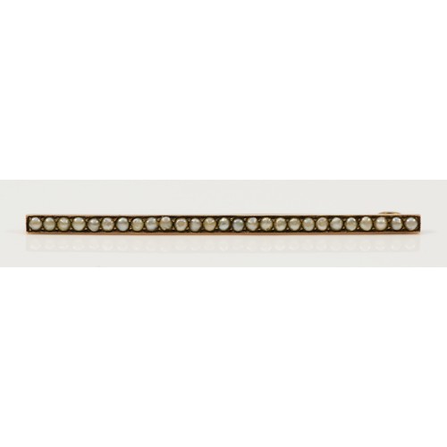 101 - A 9ct gold antique seed pearl bar brooch, 60mm across, 3.7g