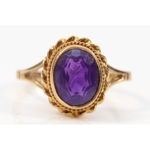 103 - A 9ct gold amethyst dress ring, K, 2.6g