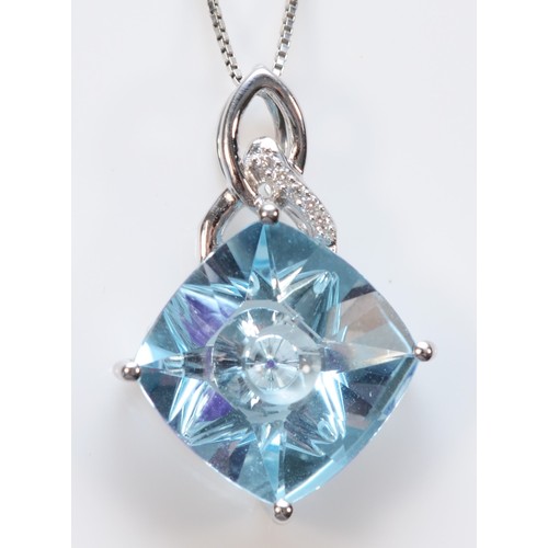 105 - A 9ct white gold contemporary fancy cut topaz and diamond pendant with necklace, 12mm x 12mm topaz, ... 