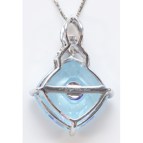 105 - A 9ct white gold contemporary fancy cut topaz and diamond pendant with necklace, 12mm x 12mm topaz, ... 