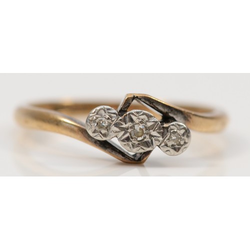 110 - A 9ct gold illusion set diamond trilogy ring, O 1/2, 2.4g