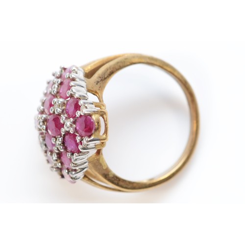 117 - A 9ct gold ruby and diamond dress ring, claw set, N, 4.8g