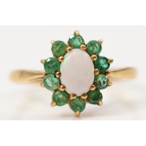 118 - A 9ct gold 1970s opal and emerald cluster ring, claw set, O 1/2, 2.3g