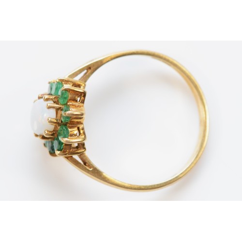 118 - A 9ct gold 1970s opal and emerald cluster ring, claw set, O 1/2, 2.3g