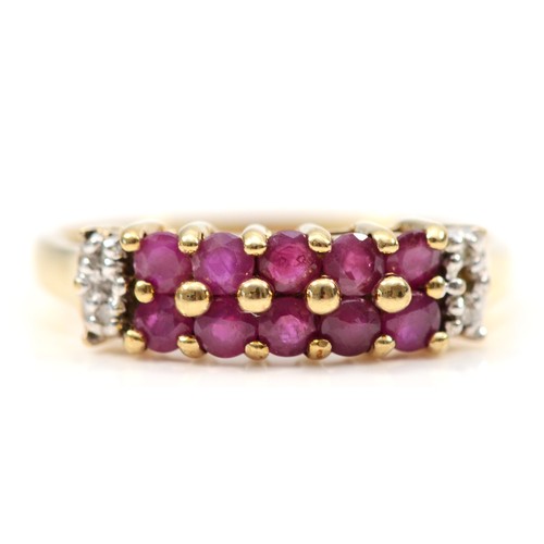 128 - A 9ct gold ruby and diamond two row dress ring, claw set, P, 2g