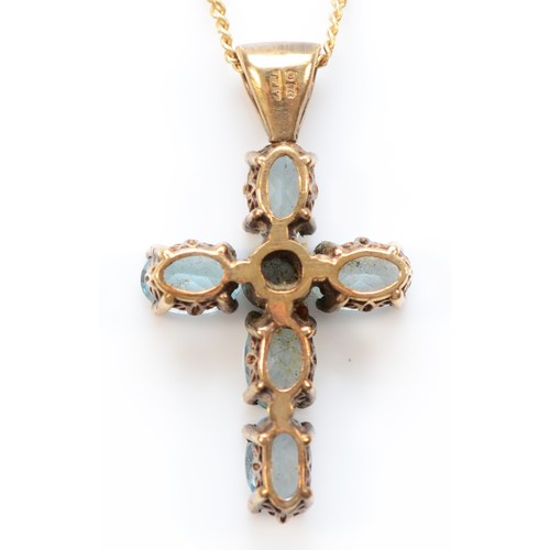 132 - A 9ct gold vari-cut blue gemstone cross pendant with necklace, 23mm cross, 4.5g