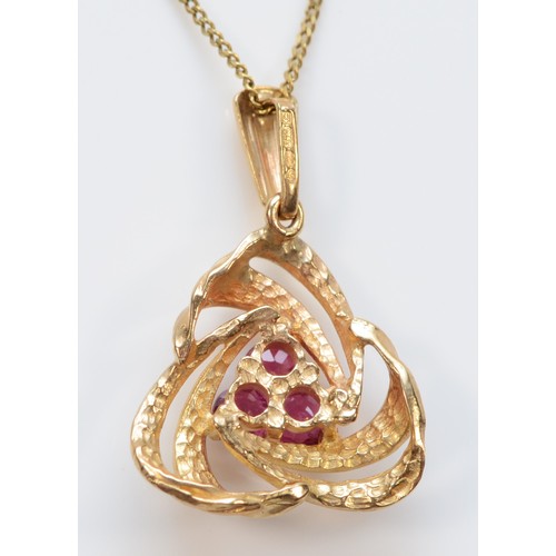 133 - A 9ct gold ruby pendant with necklace, 13mm pendant, 2.1g