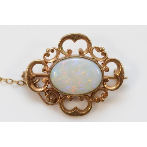 144 - A 9ct gold vintage opal brooch, 25mm across, 5.3g