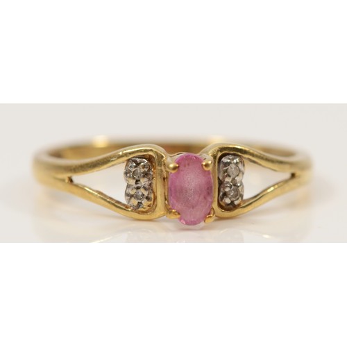 319 - A 9ct gold oval cut ruby and diamond dress ring, claw set, O, 1.4g