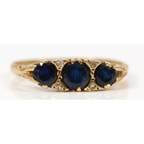 321 - A 9ct gold sapphire and diamond ring with patterned gallery, S 1/2, 2.4g