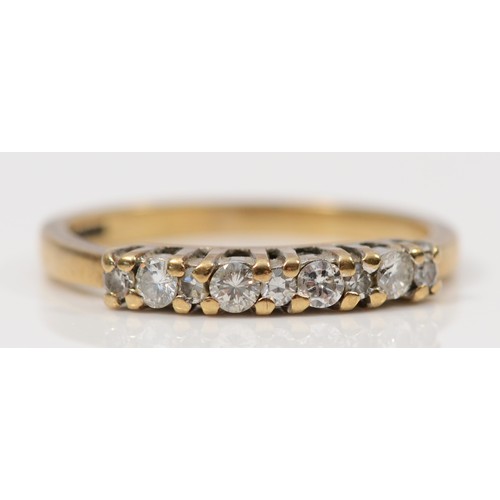 327 - A 9ct gold diamond eternity ring, claw set, L 1/2, 1.8g