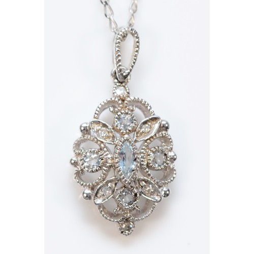 334 - A 9ct white gold blue gemstone and diamond pendant with necklace, 15mm pendant, 2.9g