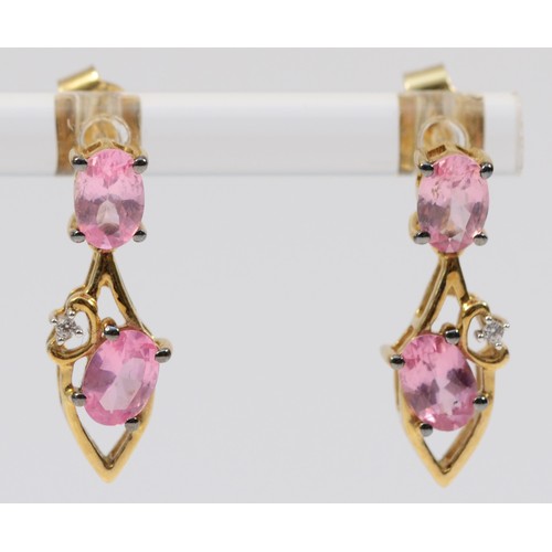 341 - A pair of 9ct gold pink and white gemstone drop earrings with scroll backs, 20mm drop, 2.5g