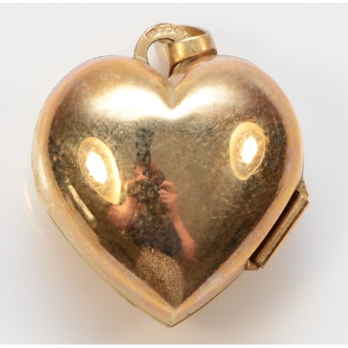 344 - A 9ct gold heart shaped patterned locket, 1.2g