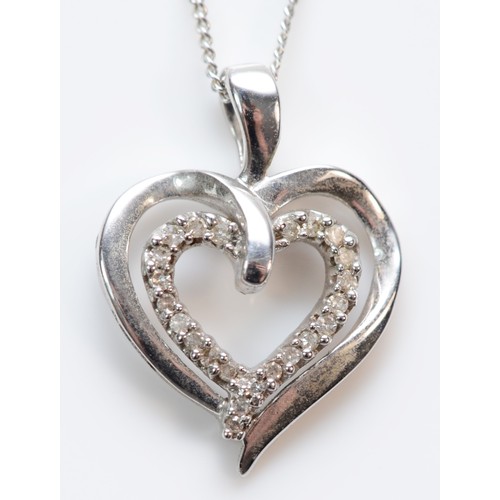 353 - A 9ct white gold diamond set double open heart pendant with necklace, 13mm heart, 2.2g