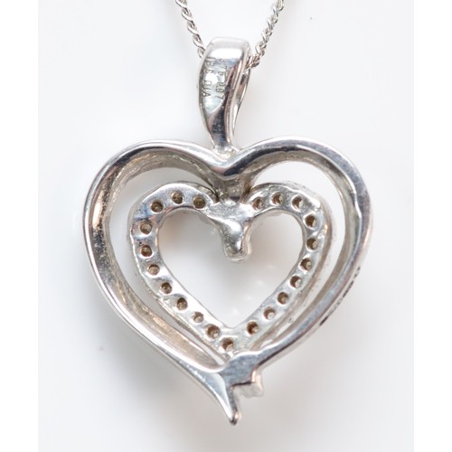 353 - A 9ct white gold diamond set double open heart pendant with necklace, 13mm heart, 2.2g