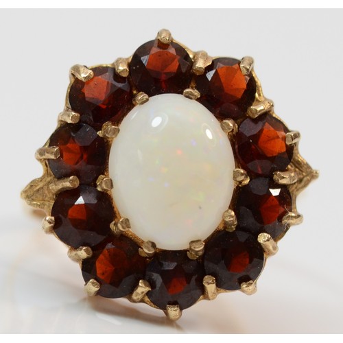 354 - A 9ct gold garnet and opal cluster ring, M 1/2, 3.6g