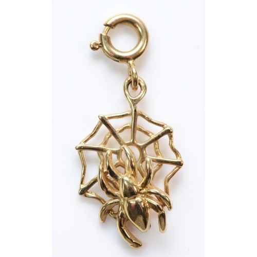 355 - A 9ct gold spider on web charm, 1.5g