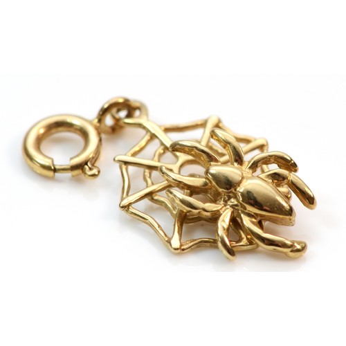 355 - A 9ct gold spider on web charm, 1.5g