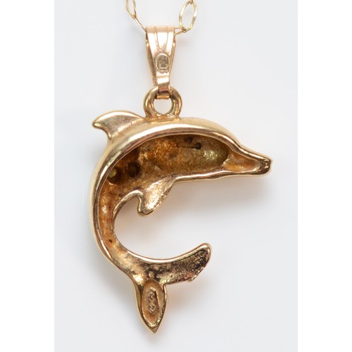 358 - A 9ct gold diamond accented dolphin pendant with necklace, 1.9g