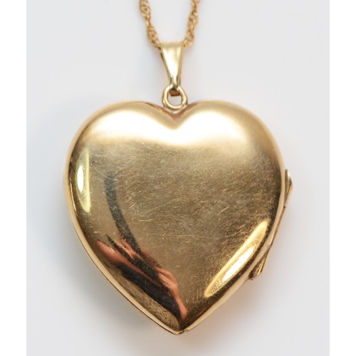 359 - A 9ct gold diamond set heart shaped locket with necklace, 20mm heart, 3.6g