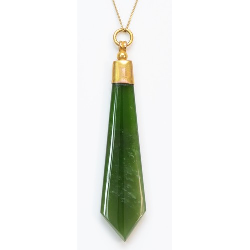 362 - A 9ct gold carved nephrite pendant with necklace, 50mm pendant, 4.6g