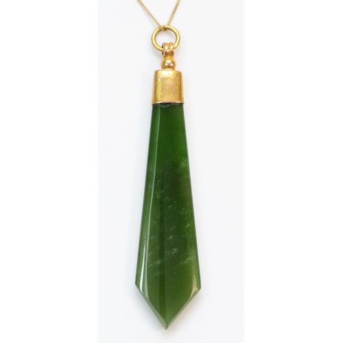 362 - A 9ct gold carved nephrite pendant with necklace, 50mm pendant, 4.6g