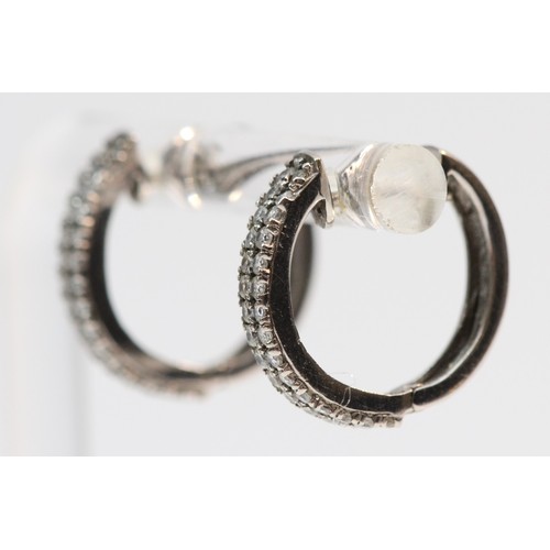 364 - A pair of 9ct white gold gemstone set hoop earrings, 2.9g