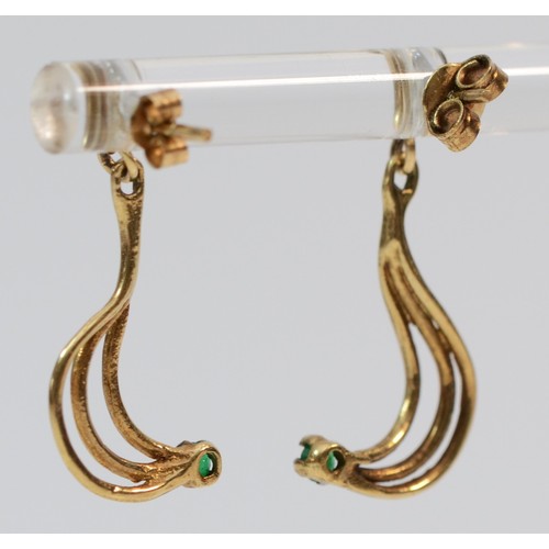 367 - A pair of 9ct gold emerald set swirl drop earrings, 25mm drop, 1.4g