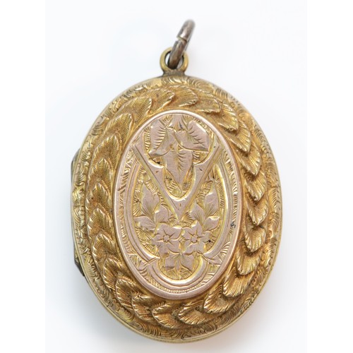 368 - A 9ct gold back and front antique repousse and engraved locket, 30mm, 7.5g