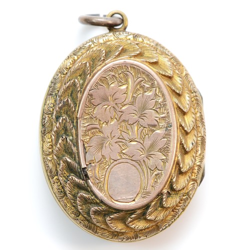 368 - A 9ct gold back and front antique repousse and engraved locket, 30mm, 7.5g