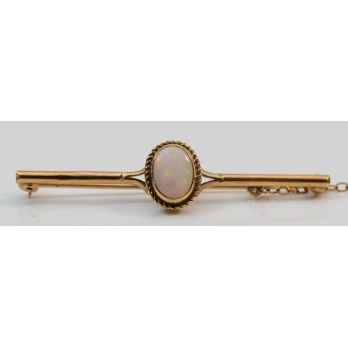 371 - A 9ct gold rope edged opal set bar brooch, 45mm, 2.3g