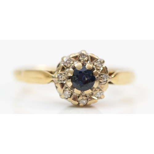 375 - An 18ct gold sapphire and diamond set cluster ring, N, 2.4g