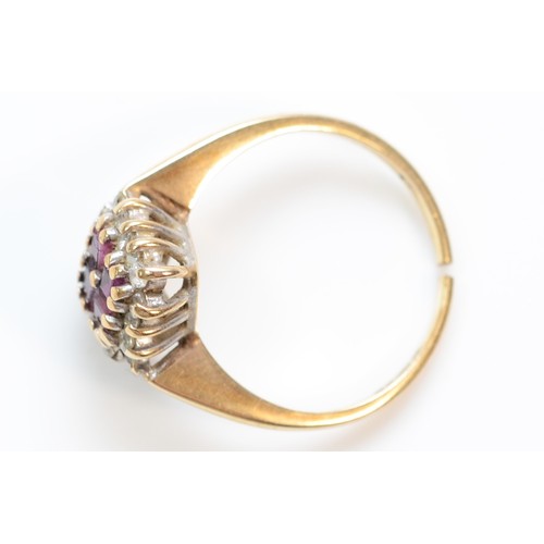 377 - A 9ct gold ruby and cubic zirconia cluster ring, J 1/2, 2.2g