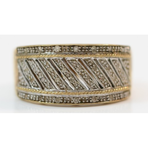 379 - A 9ct gold pave set diamond band ring, O 1/2, 4.9g