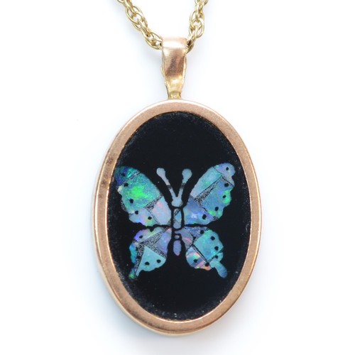 381 - A 9ct gold opal triplet butterfly pendant with necklace, 17mm length, 2.5g