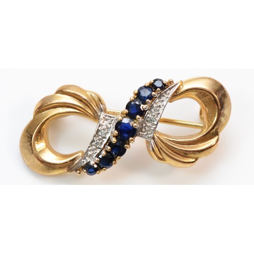 383 - A 9ct gold diamond accented sapphire bow brooch, 33mm, 2.7g