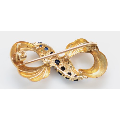 383 - A 9ct gold diamond accented sapphire bow brooch, 33mm, 2.7g