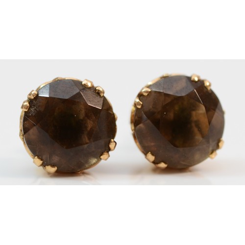 384 - A pair of 9ct gold smokey quartz solitaire stud earrings, 10mm diameter, 3.6g