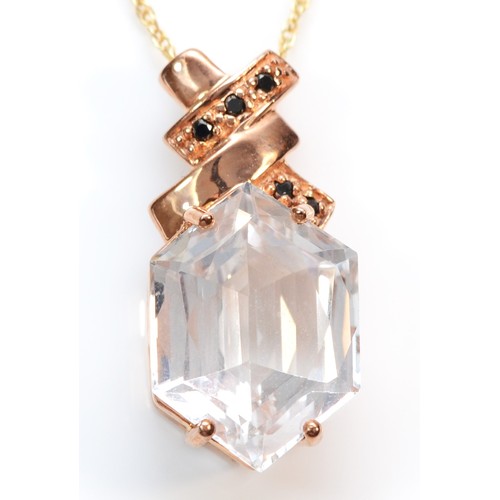 386 - A 9ct rose gold fancy cut topaz and black gemstone pendant with necklace, 17mm x 13mm topaz, 6.7g