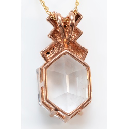 386 - A 9ct rose gold fancy cut topaz and black gemstone pendant with necklace, 17mm x 13mm topaz, 6.7g