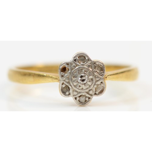 387 - An 18ct gold platinum topped diamond set floral cluster ring, one setting vacant, O, 2.3g