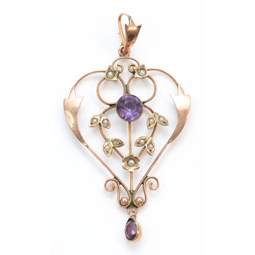 390 - A 9ct rose gold seed pearl and purple paste pendant, 53mm length, 2.3g