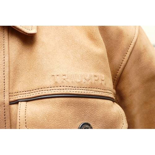 62 - Triumph Motorcycles Company; a nubuck leather jacket, having shoulder and elbow armour, size large, ... 