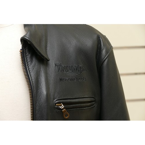 64 - Triumph Motorcycles Company; a black leather all seasons motorcycle jacket, size 42inch chest, as ne... 