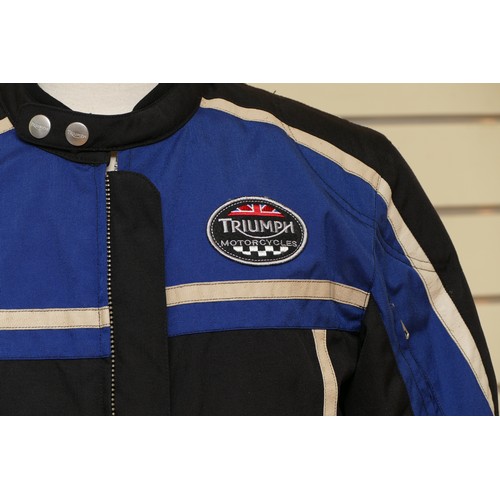 65 - Triumph Motorcycles Company; an all seasons sheltech motorcycle jacket, blue and black with removabl... 