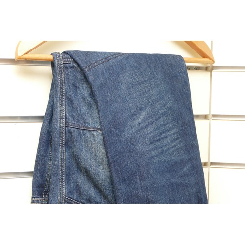 56 - A pair of Kevlar reinforced denim motorcycle jeans, size 32/33cm, as new condition.