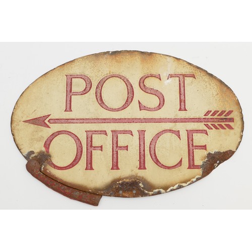 80 - A double-sided Post Office directional enamel sign, of oval form with red lettering on a cream groun... 