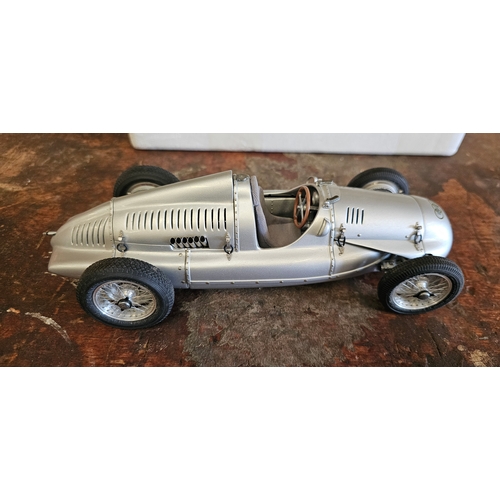 119 - An Auto Union Typ d, 1938/39 1:18 scale metal die cast model, case, certificate.